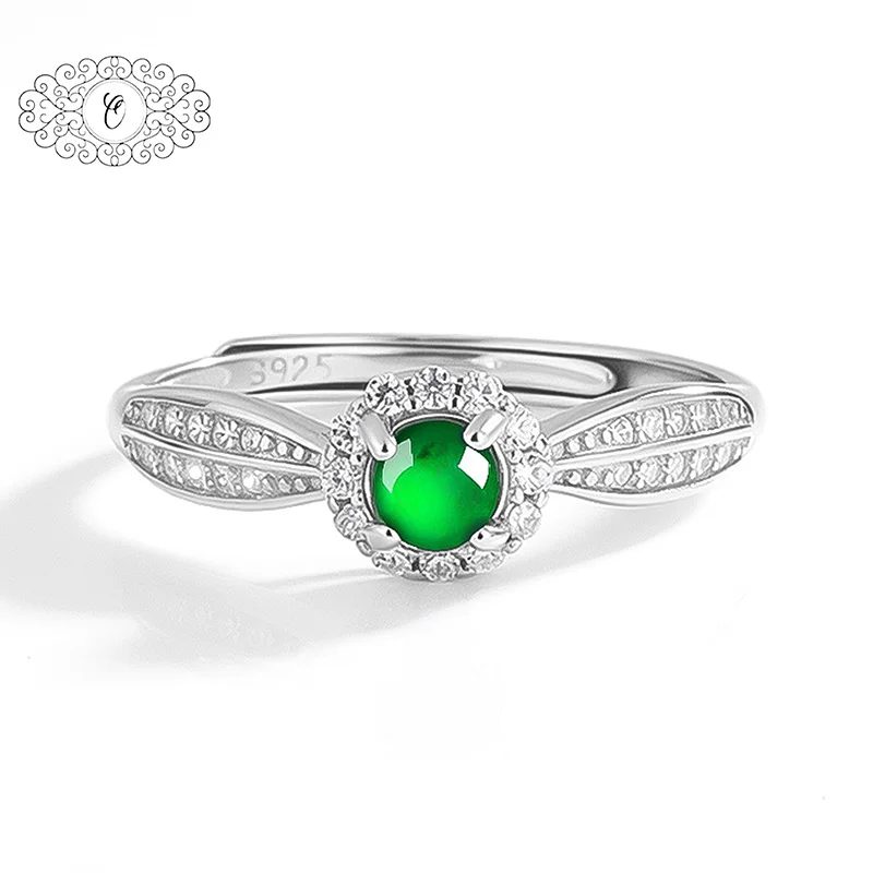 

Elegant Solitaire Jade Ring, Featuring a Statement Oval Green Jadeite With a Micro-Set Zirconia Band