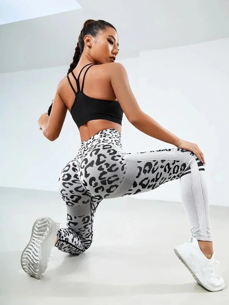 Pantaloni da Yoga senza cuciture leopardati da donna vita alta sollevamento dell'anca miele pesca pantaloni da Fitness tuta da Yoga pantaloni sportivi da corsa stretti