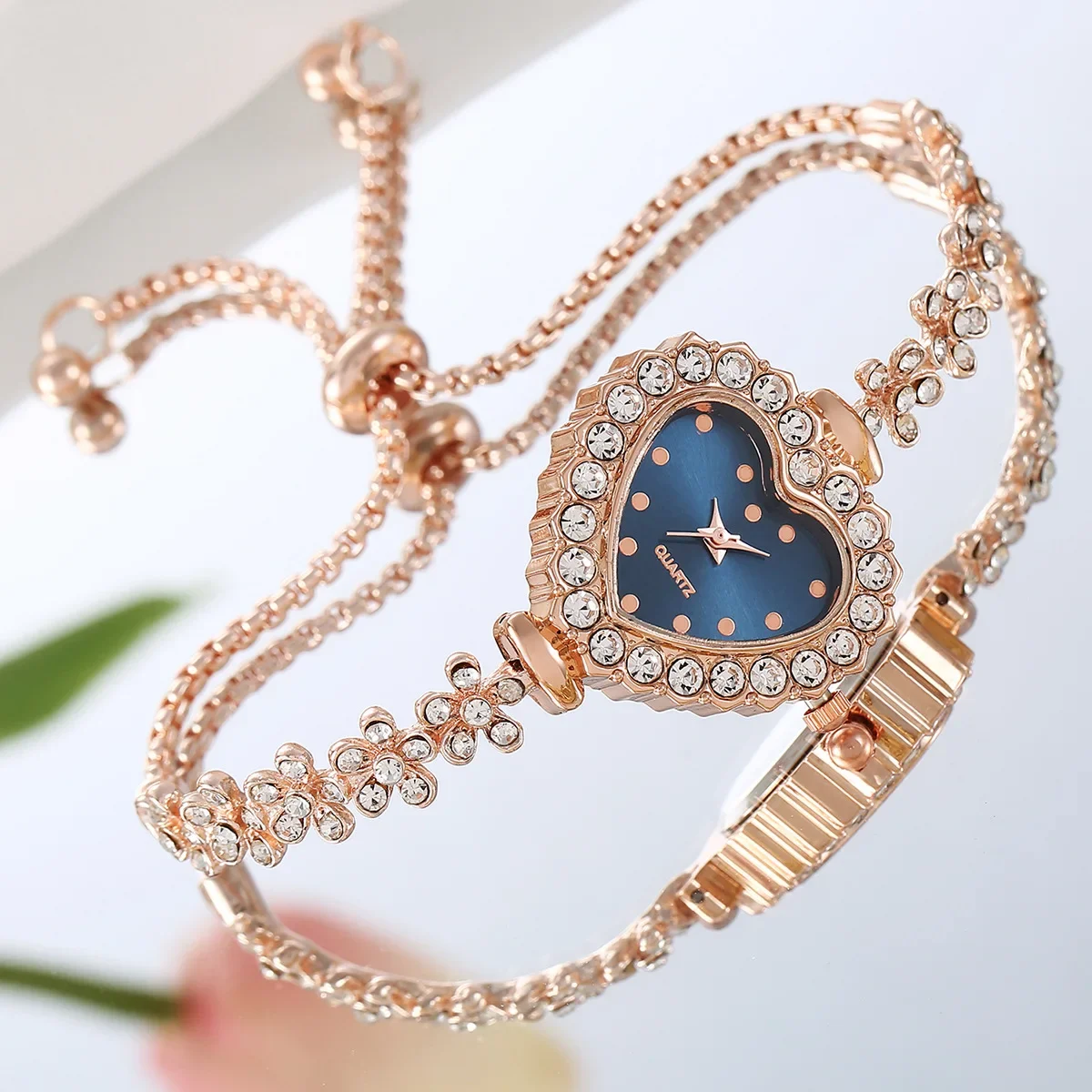 New fashionable floral bracelet with diamond inlaid heart colored dial for women's atmospheric and versatile self adjusting stra