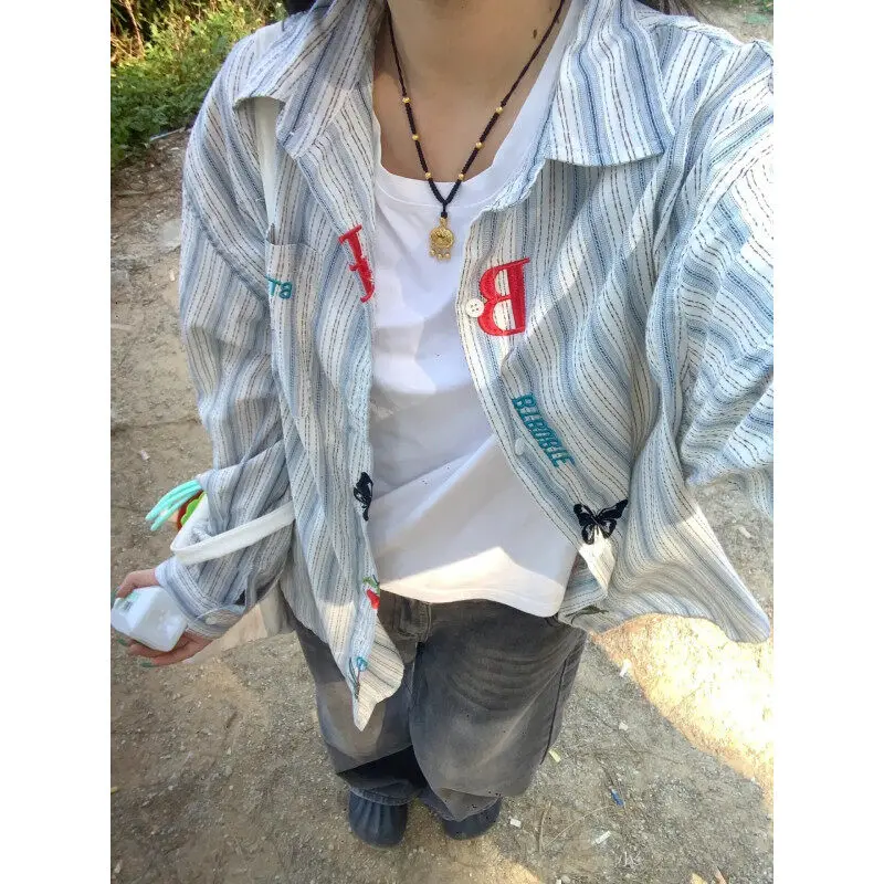 Simple embroidered striped shirt women's new spring design sense chic long-sleeved top coat