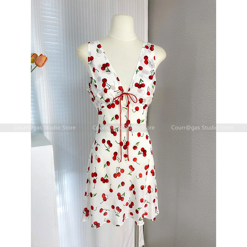 French niche fashion hottie sleeveless white V-neck silk cherry dress short female