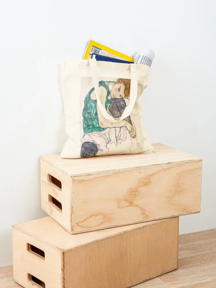 Egon Schiele - Seated Woman with Legs Drawn Up (Adele Herms) (Sitzende Frau mit angezogenem Knie) 1917 Tote Bag