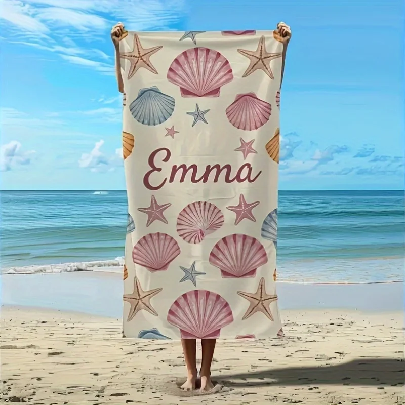 

A microfiber beach towel that can be customized with a name, featuring shell and starfish patterns. It is very soft, fast drying