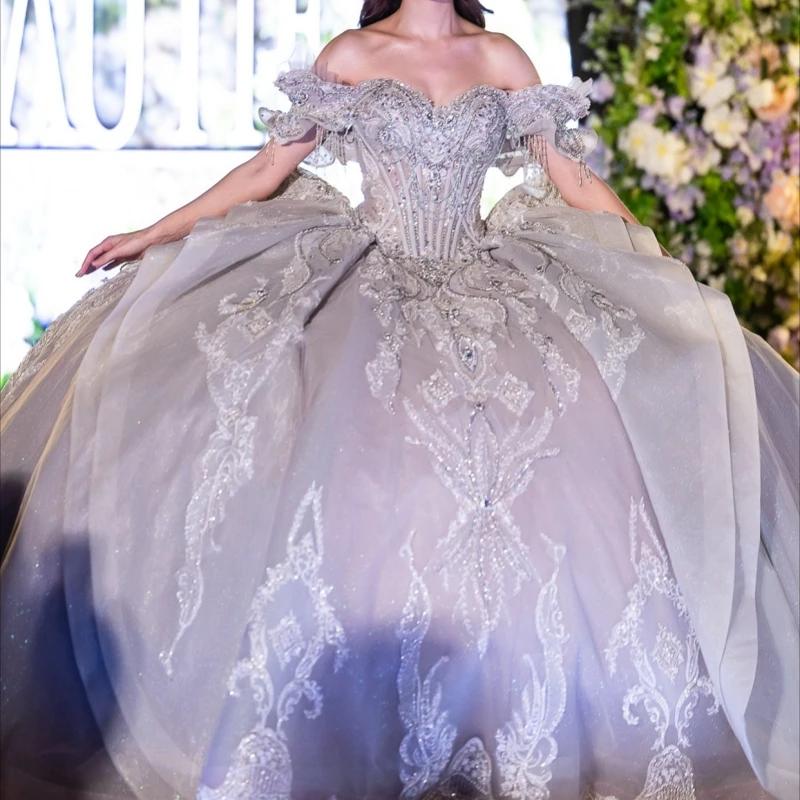 أرجواني فاتح لامع فساتين Quinceanera قبالة الكتف الترتر زين الدانتيل الديكور كريستال تول مشد حفلة عيد ميلاد الحلو 16