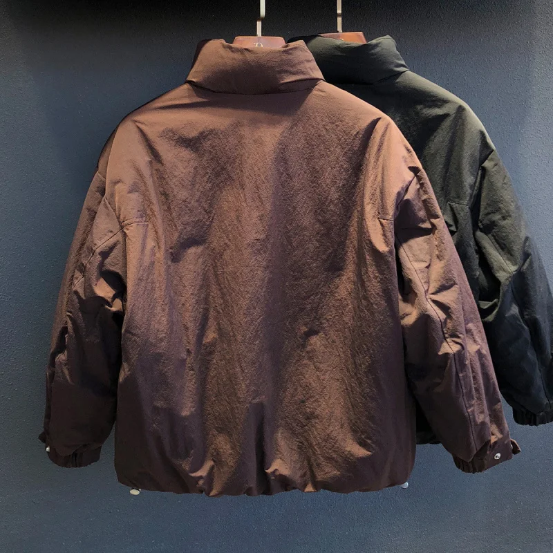 

2025 new casual style stand up collar down jacket for men, versatile, warm, simple, pure color, high-end cold resistant coat