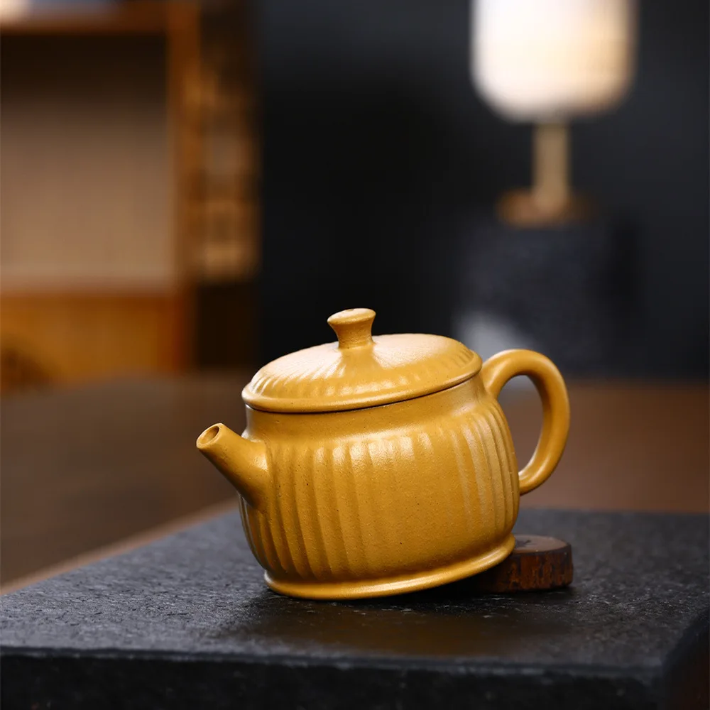 

190cc Yixing purple sand pot raw mine high temperature mud wood cooking mouth kung fu home tea set Jade rabbit handmade teapot