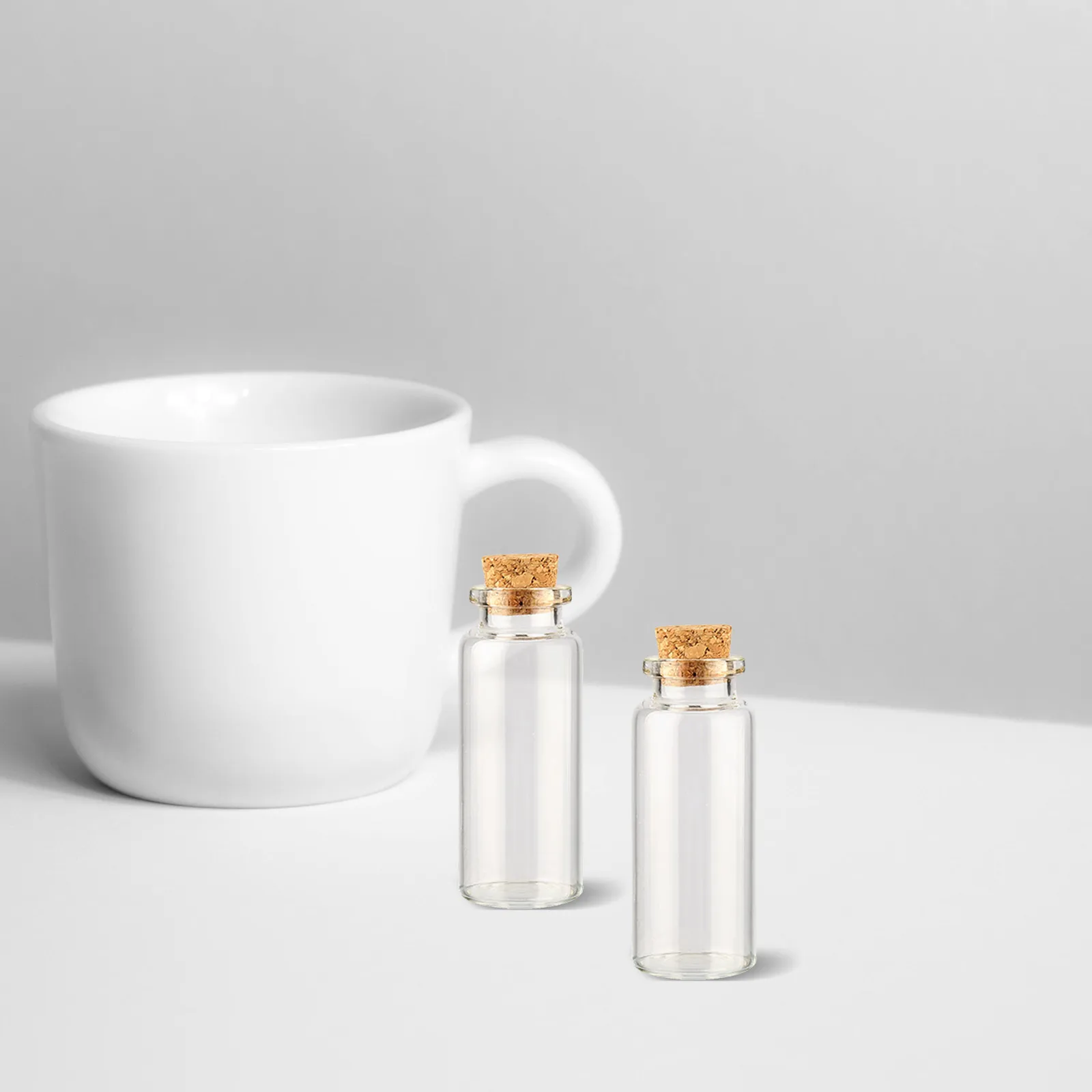 

12Pcs Glass Bottles Small Mini Jars Cork Stoppers for Craft DIY Wedding Message Bottles Spell Jars Small Glass Bottle