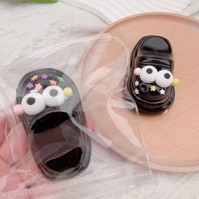 1Pcs Cute Black Big Eyed Perforated Shoes Soft Toys Slow Rebound Decompression Toy Reduce Stress Kids Toys Gifts