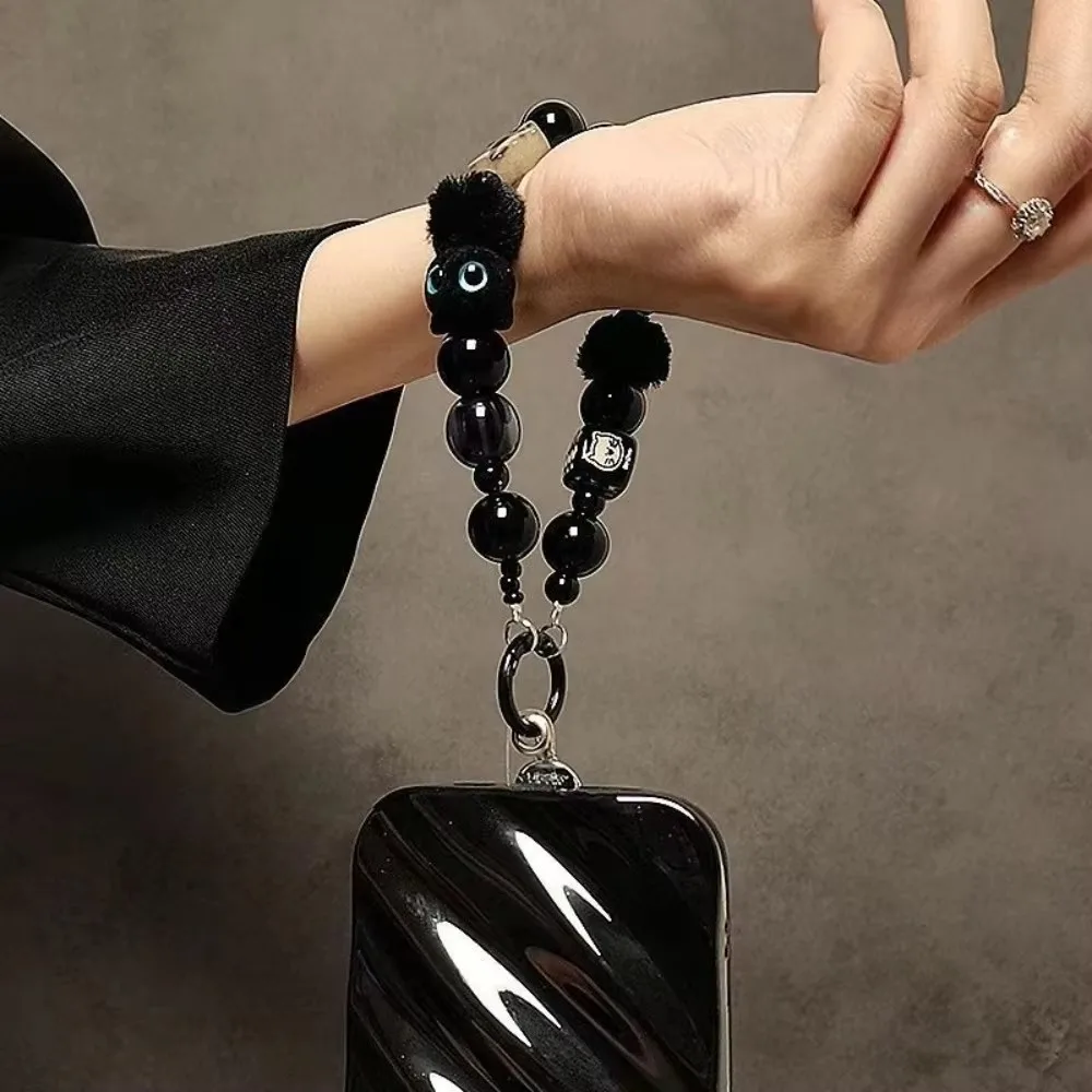 

Черный ремешок для мобильного телефона премиум-класса с мультяшным котом, анти-потерянная веревка, ремешок на запястье, плюшевый браслет из бисера, дизайн, автомобильный брелок, сумка, аксессуар