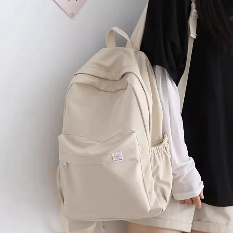 Sweet soft girl solid color large capacity student backpack new style for men and women college students simple trendy