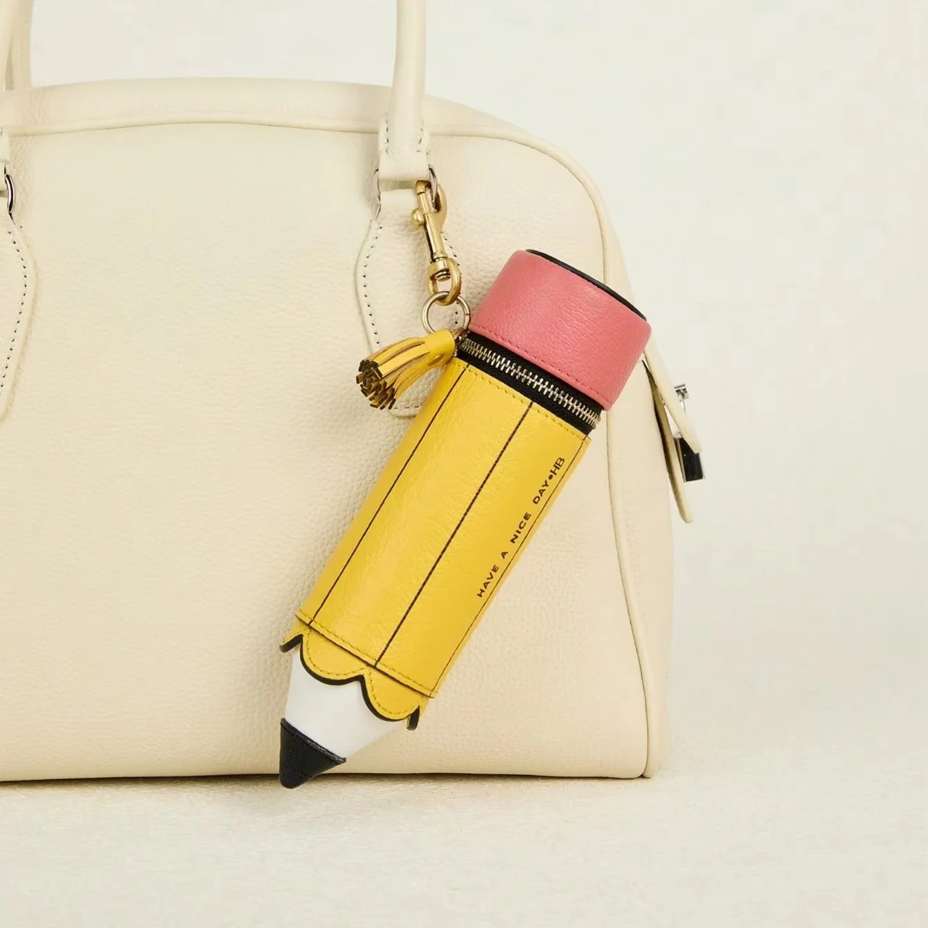 Fun pencil shaped Coin Purse, Yellow and Pink Microfiber Leather Zipper Pouch with Gold Tassel Charm
