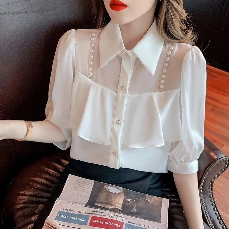 2023 New Summer Commuting Minimalist Temperament Lapel Ruffle Stitching Pearl Chain Fashion Casual Loose Fitting Women's Shirt