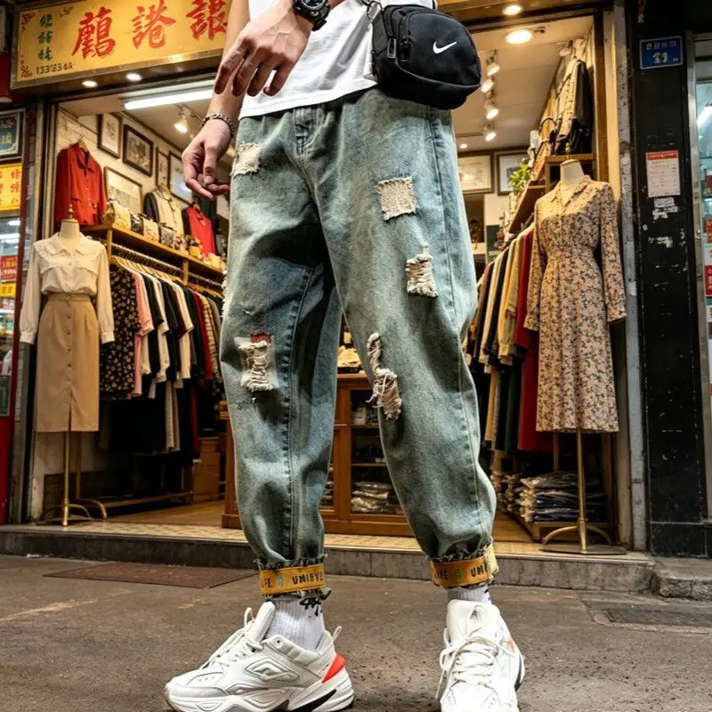 Korean Popular 2026 New Casual Ripped Tooling Jeans Men's Loose Hip-hop Beggar Harlan Leggings Large Size Vintage Harem Jeans