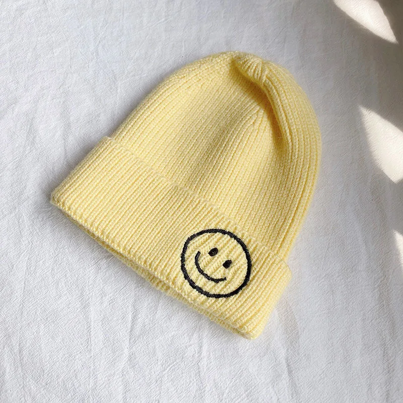 Children\'s smiley face hat Baby hat Fall Winter children boys and girls cute warm knit hat woolen hat trend