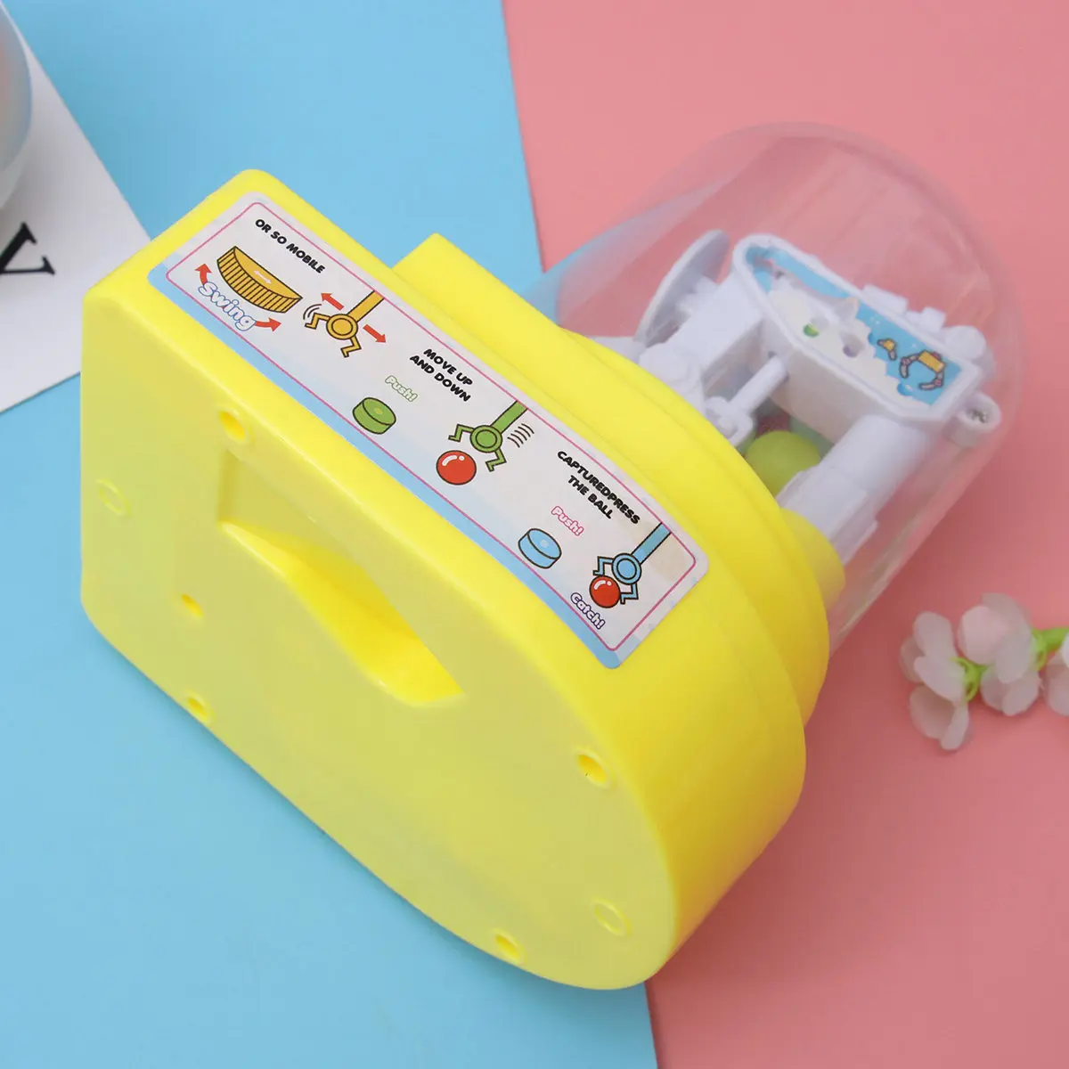 

1 шт. Желтый мини-кран-машина для захвата конфет, механический игровой автомат для детей, развивающий координацию рук и глаз