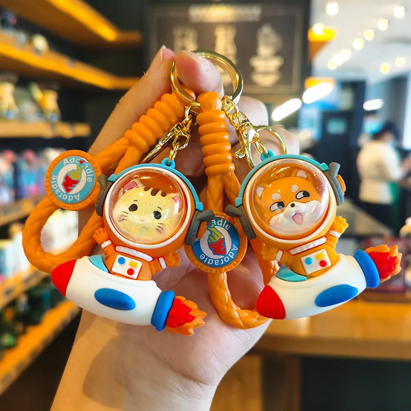 Llavero de dibujos animados de animales espaciales, accesorios creativos de muñecos astronauta, accesorios lindos para bolsos de perros con diseño de nave espacial, regalos personalizados bonitos