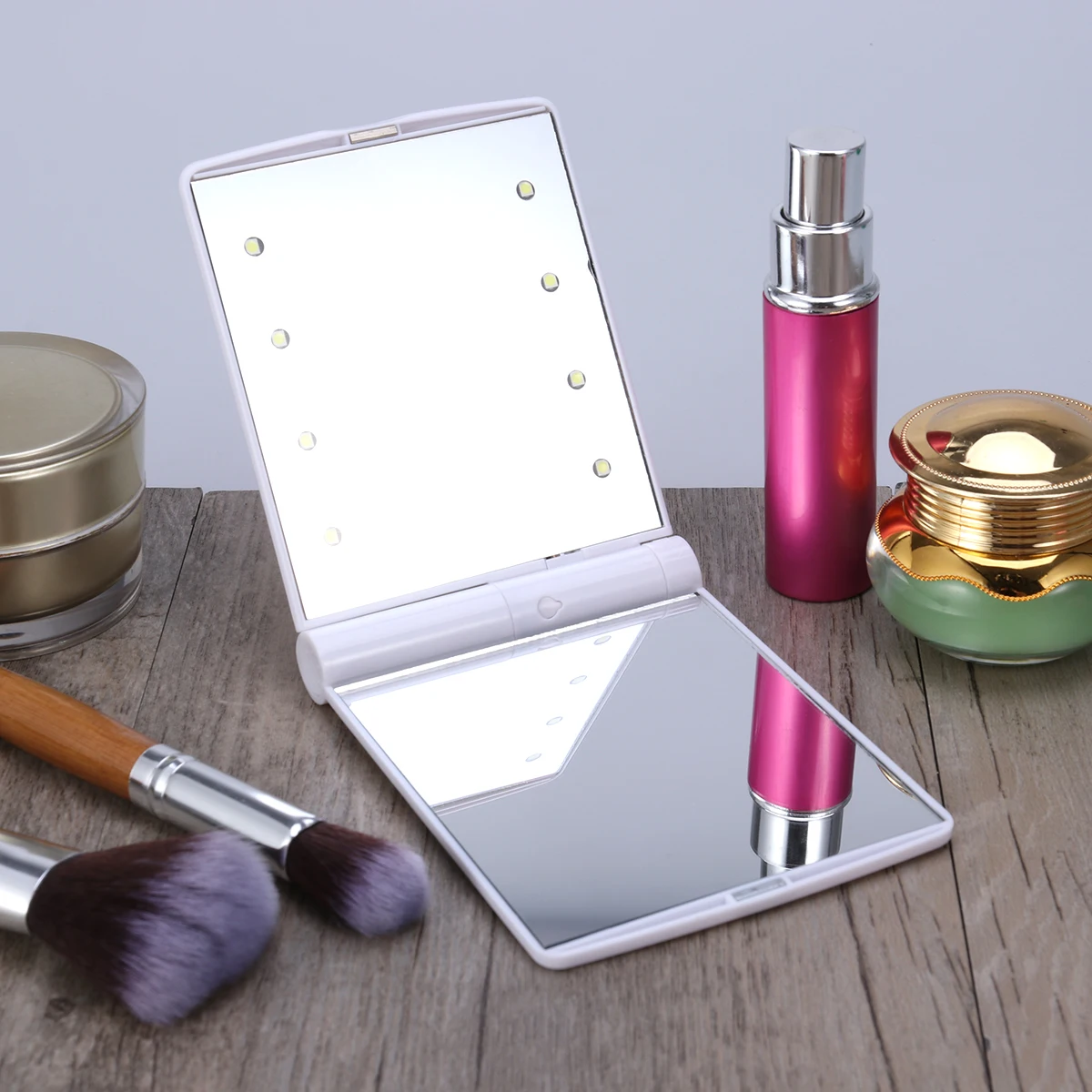 

LED Folding Built in Lights Magnifying Glasses Foldable Lighted Makeup Mirror 330 Degree Rotation Travel Size LED Mirror