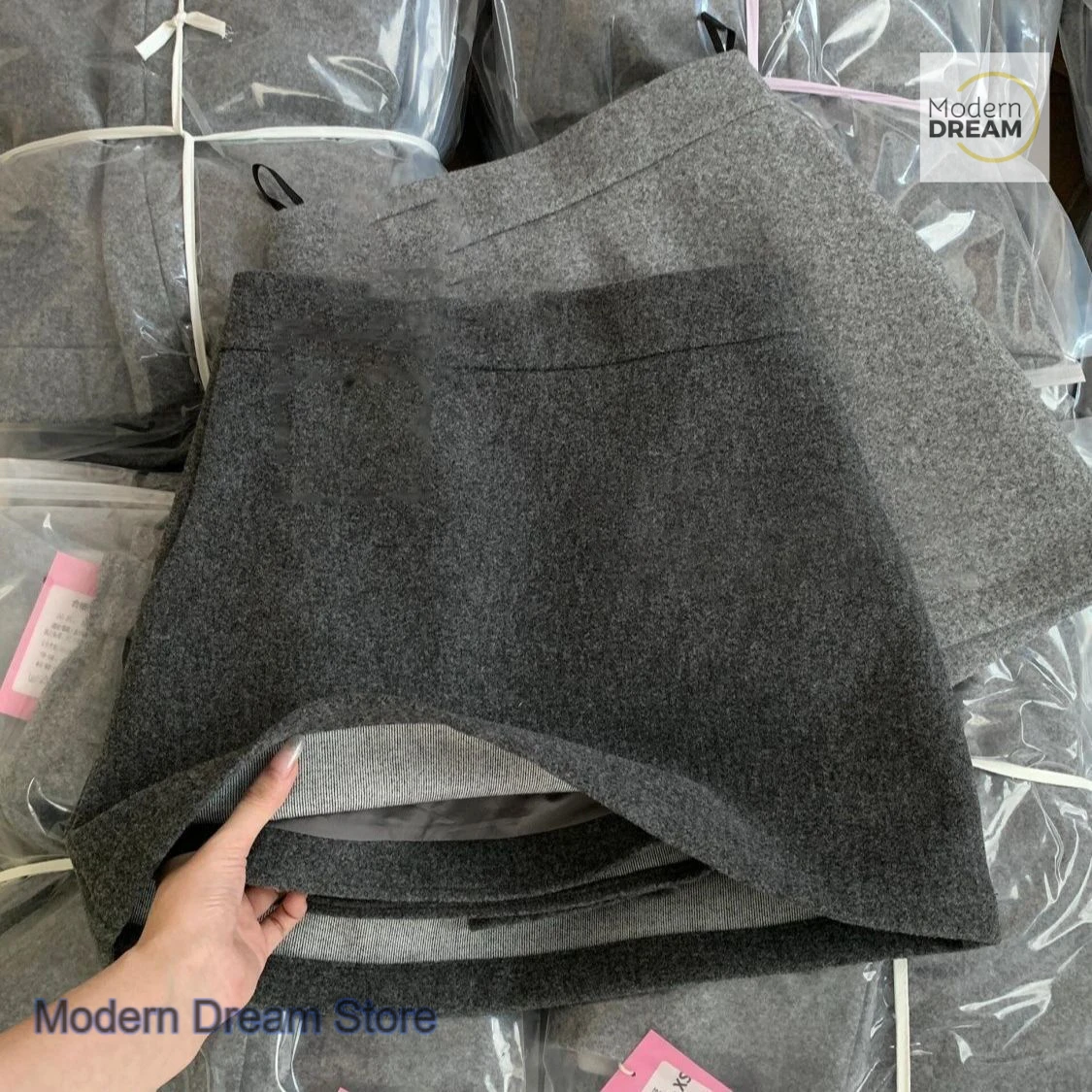 

Korean style dark gray woolen bag hip skirt women's autumn and winter new small anti-exposure elastic waist A-shaped skirt