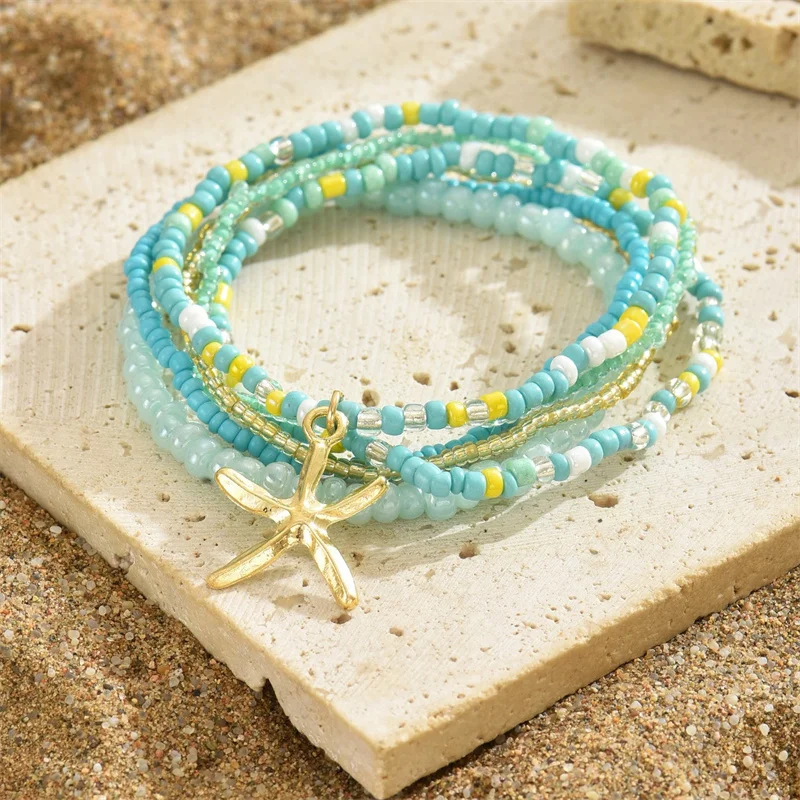 Conjunto de tobilleras con cuentas de arroz multicapa para mujer, tobilleras con colgante de estrella de mar, cadena de tobillo de playa de arena para verano, joyería de pierna, Bohemia