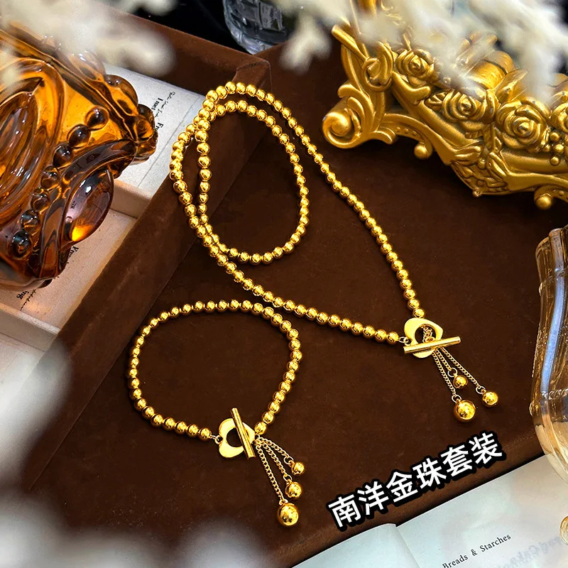 Gold plated Nanyang gold pearl ot love button fringe necklace bracelet female wholesale 9999gold