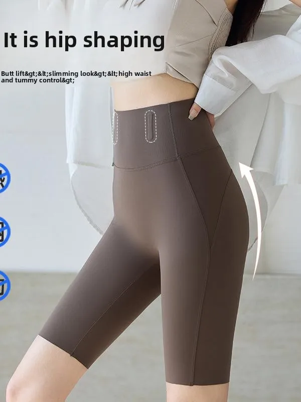 سروال يوجا نسائي عالي الخصر لركوب الدراجات رفيع من Spor Fitn بطول خمسة أرباع طبقة أساسية من البوليستر...