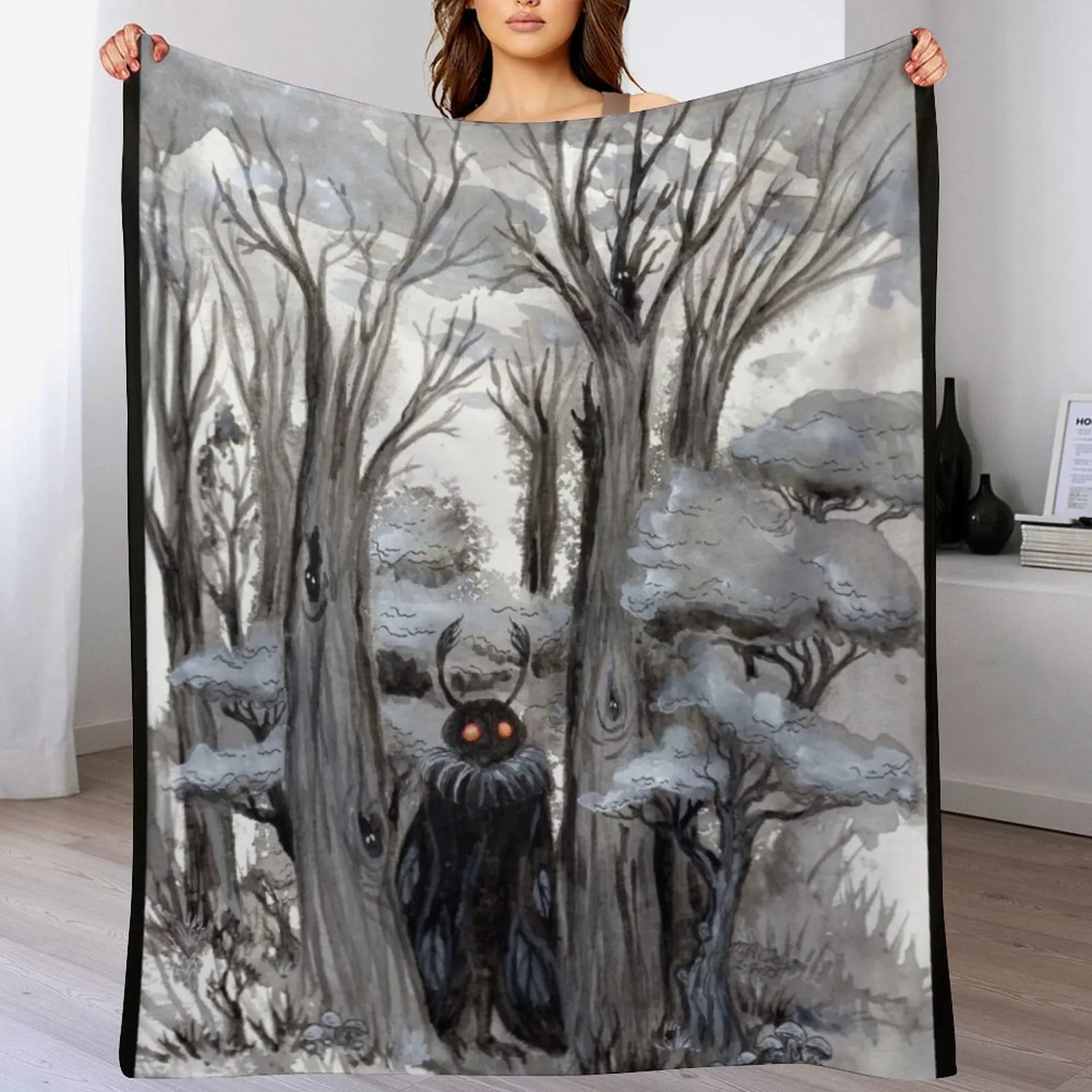 

Shy Mothman Throw Blanket