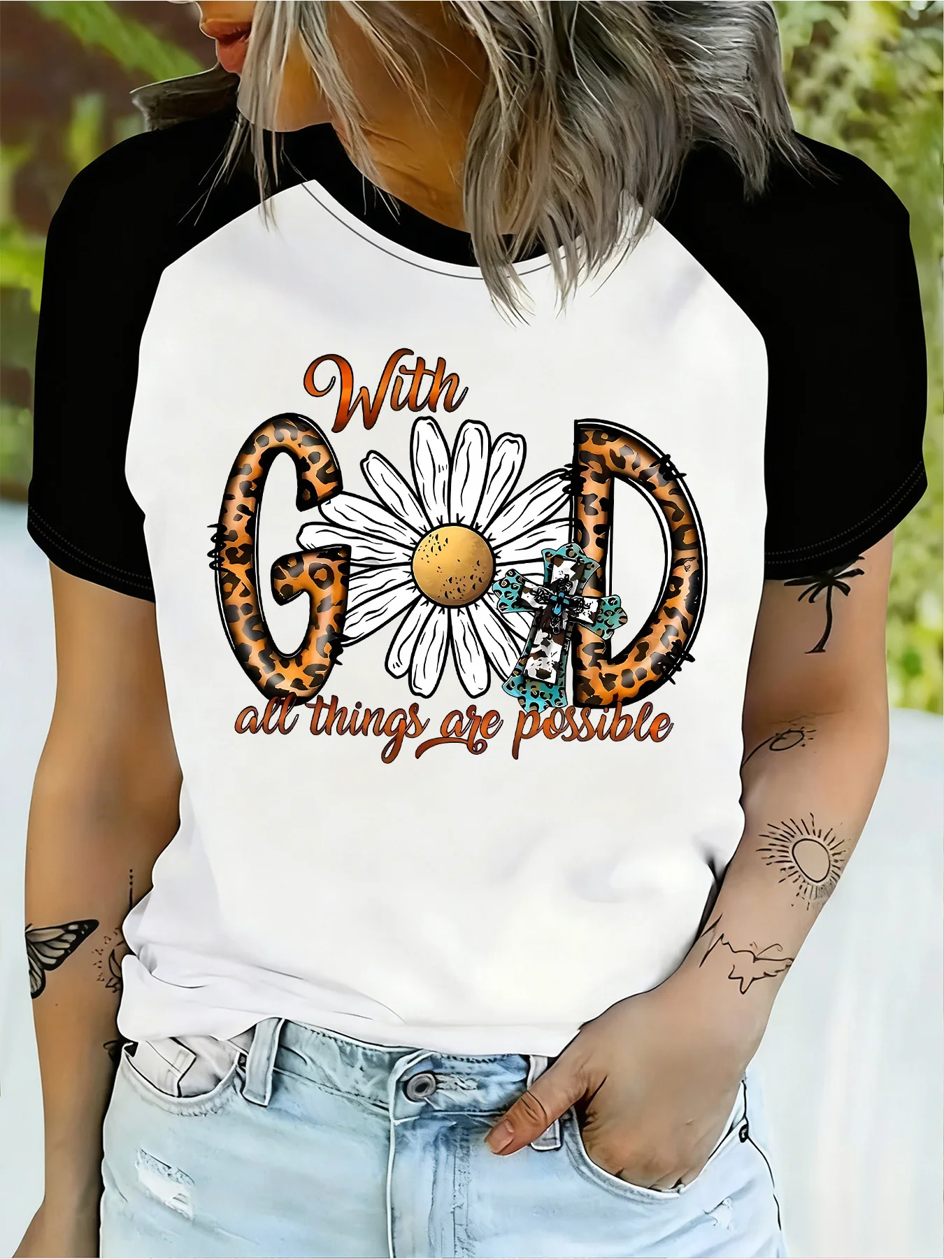 Fashionable T-Shirt with Black and White Color Combination, Leopard Print Letters, Daisy and Cross Patterns, Raglan Sleeves, Trendy Personalized Printed Top