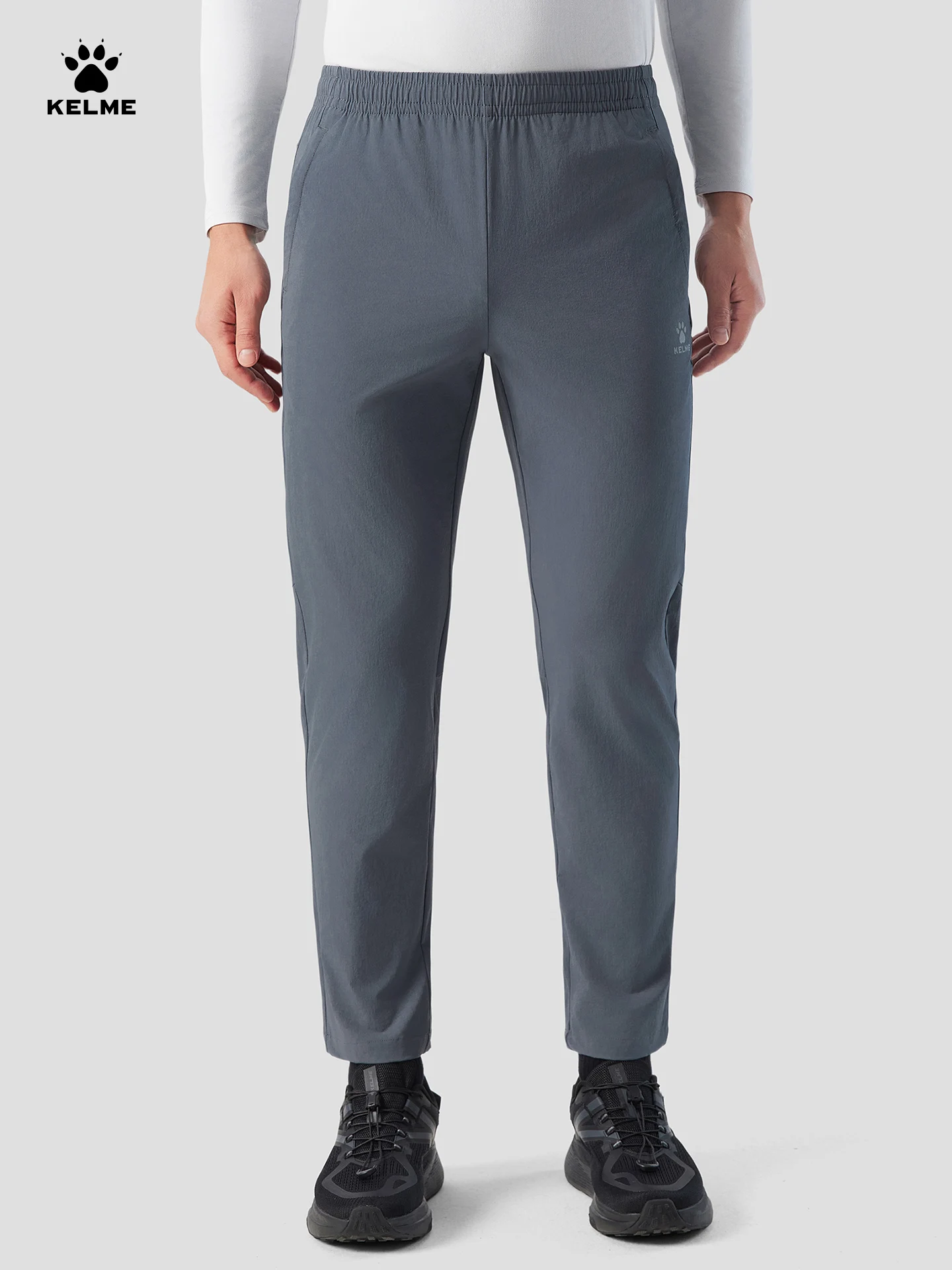 Kelme الرجال السراويل الرياضية التجفيف السريع الخريف السراويل المنسوجة التدريب سراويل تقليدية المشي لمسافات طويلة في الهواء الطلق تشغيل السراويل