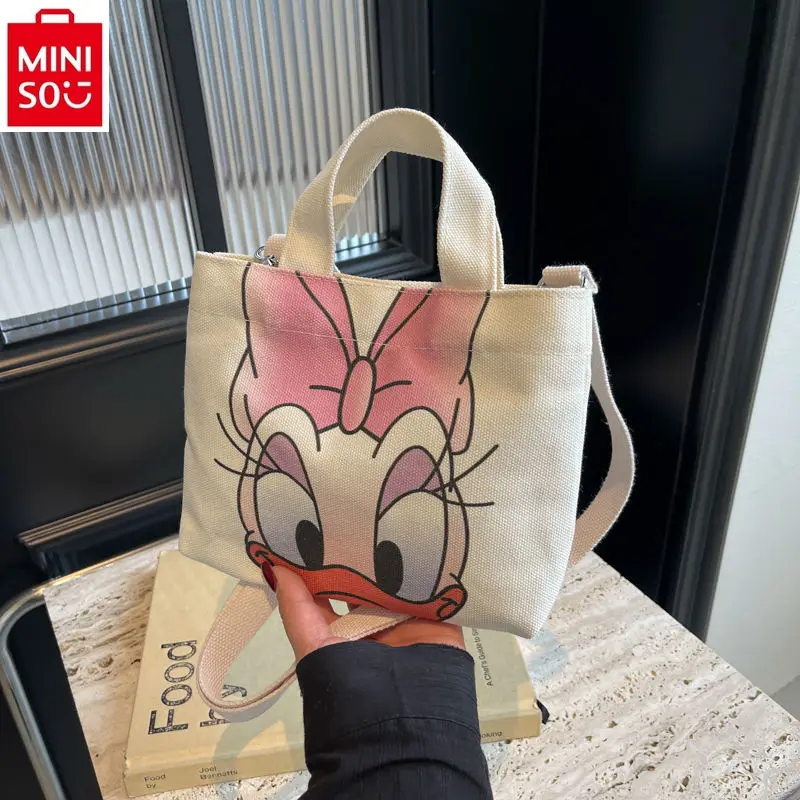 

MINISO Disney Donald Duck Printed High Quality Canvas Crossbody Large Capacity Handbag Student Learning Storage Bag