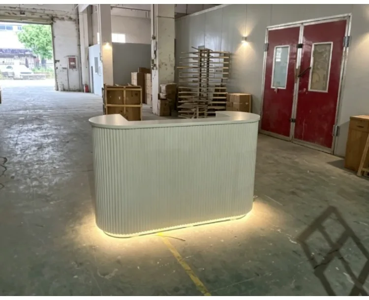 Modern Curved Reception Desk with LED Light Beige Wave Front Desk for Beauty Salon Nail Shop Spa Commercial Furniture