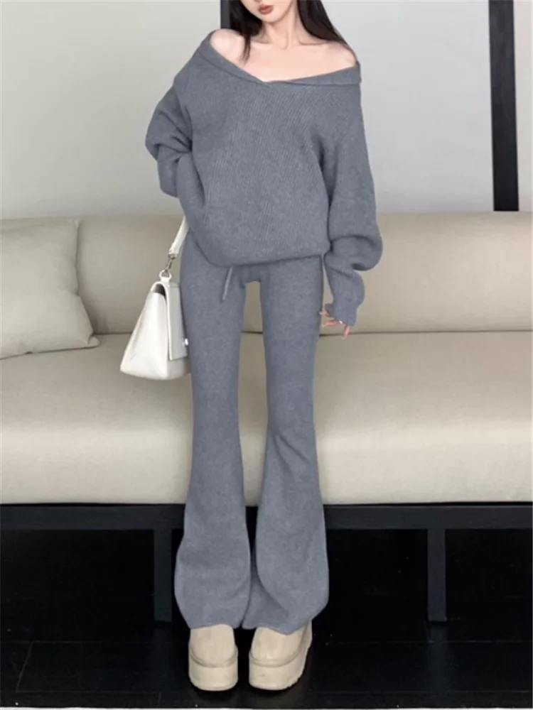 Negro gris Beige nuevo otoño mujeres 2 piezas conjuntos de punto estilo perezoso cuello en V fuera del hombro suéter suelto y pantalones acampanados de cintura alta trajes