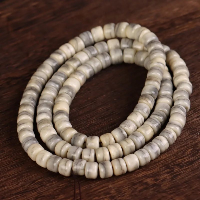 

Patterned yak bone 108- Buddhist with beads, vintage Tibetan-style bead bracelet and necklace