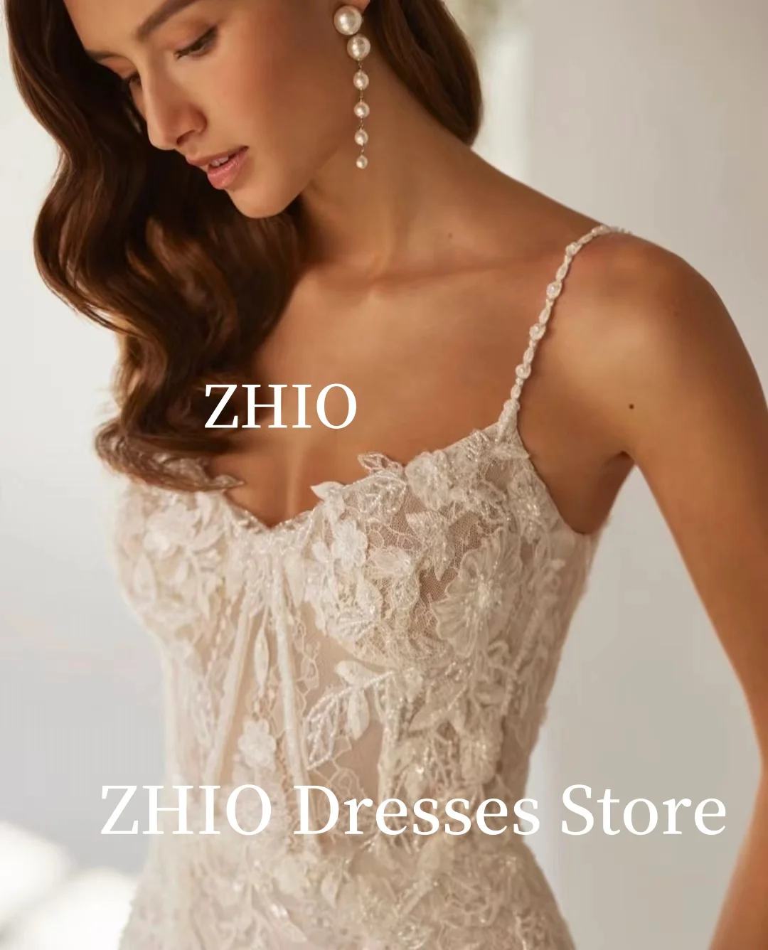 ZHIO หรูหรา Applique ชุดเดรสเมอร์เมดสปาเก็ตตี้ Tulle Ivory Sweep Train อย่างเป็นทางการชุดราตรีชุดเจ้าสาวปรับแต่ง