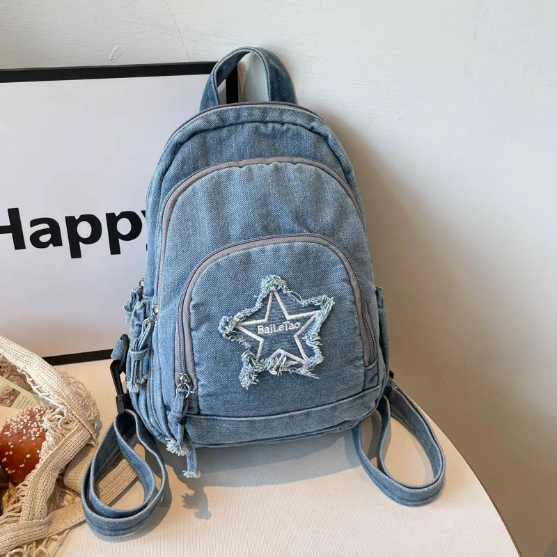 

Fashion Y2K Denim Backpack Women Washed Blue Jeans Rucksack with Frayed Star Patch New School Bag Casual Travel Daypack Mochila