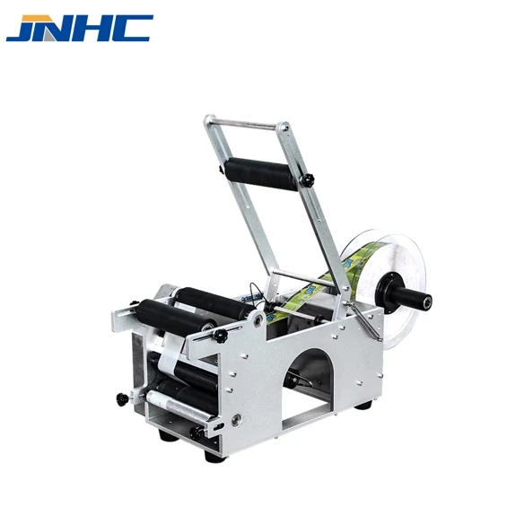 

Manual Desktop Sticker Small Round Glass Vial Bottle Adhesive Label Semi Automatic Labeling Machine