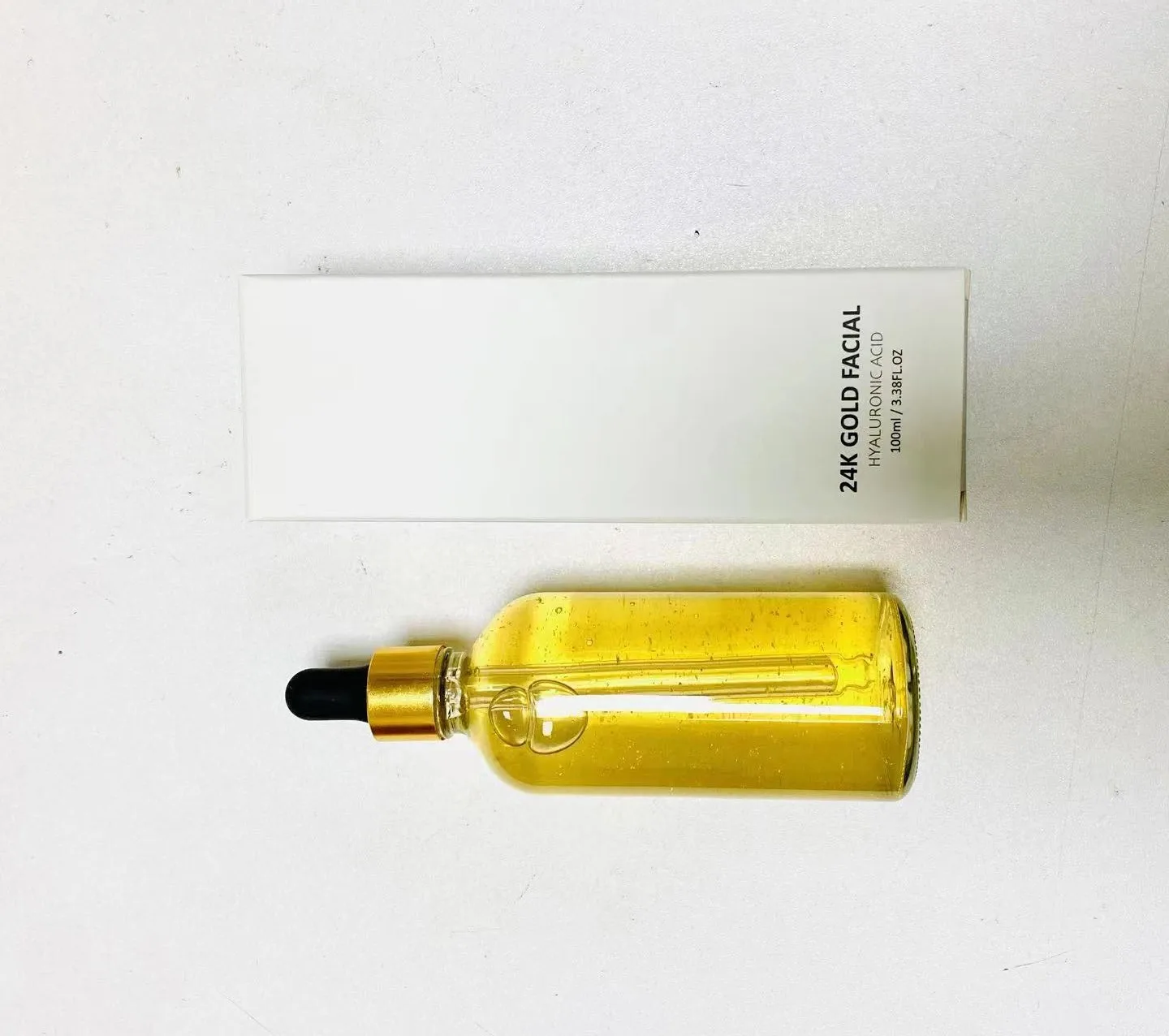 100ml 24Kゴールドエッセンス プライベートラベル ヴィーガン 長時間保湿 しわ対策 カスタムロゴ メイクアップ 卸売