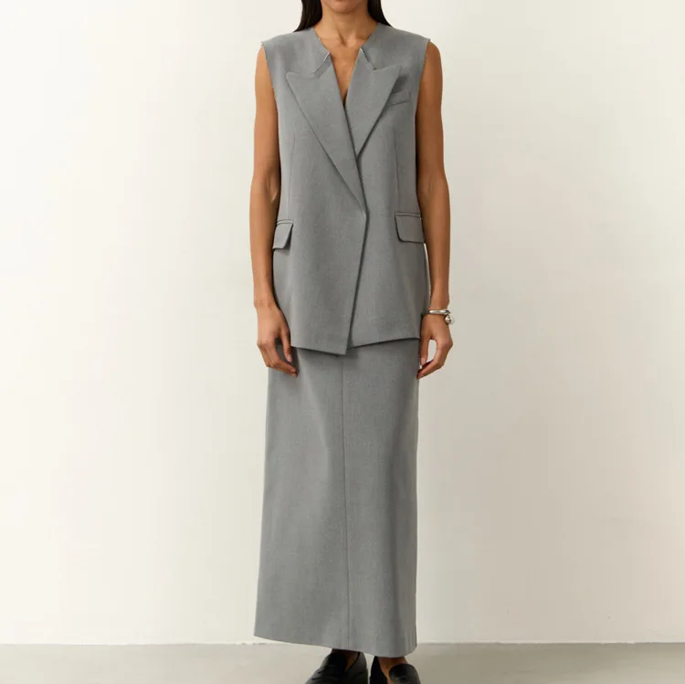 Women's Lady Cloth-style West Set: A Simple. And Fashionable V-neck Sleeveless Cardigan. Top Paired With A Fatigue Midi Skirt A