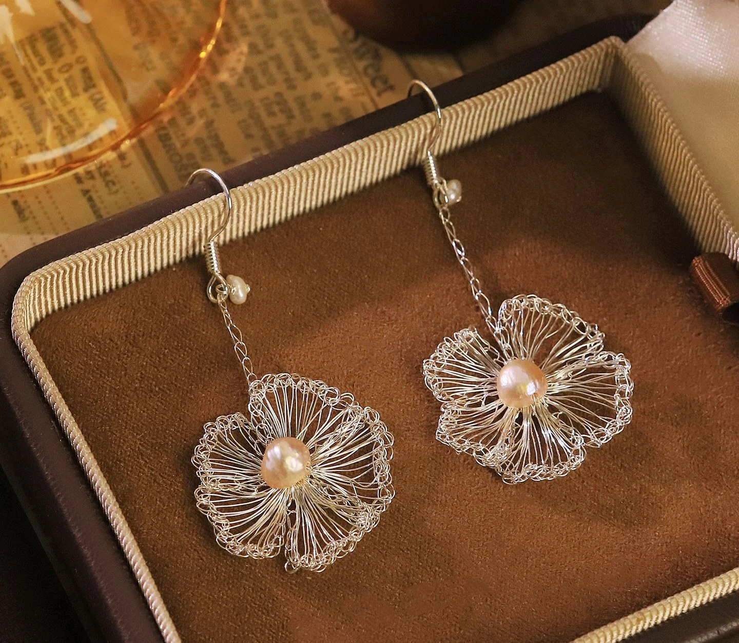 Original design hand-woven metal flowers. Perfect for daily use and helps make your face look smaller.