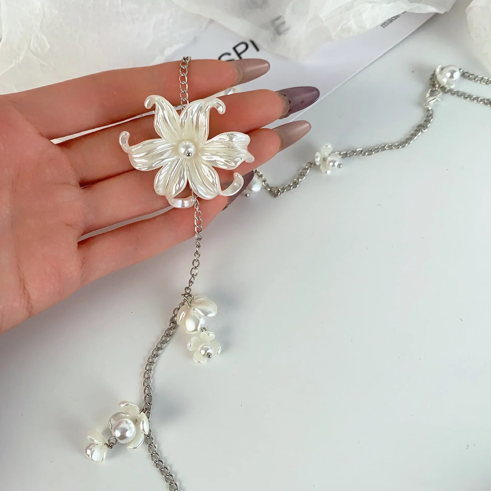 Sweet and cool style flower tassel waist chain female elegant personality temperament belt ins fashion trend versatile clothing
