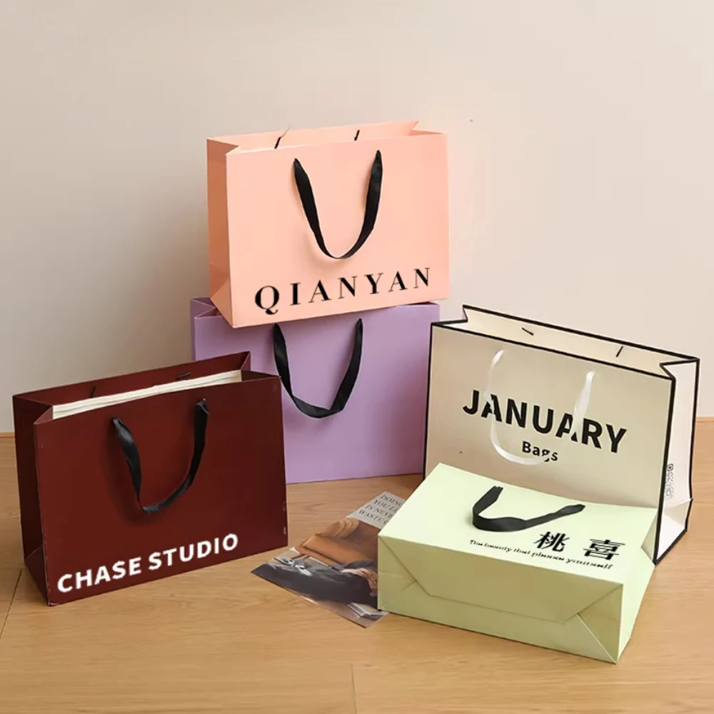 50Pcs/lot Personalization Business Shopping Clothes Package Bag with Handles Festival Gift Paper Packing Bag Custom Logo