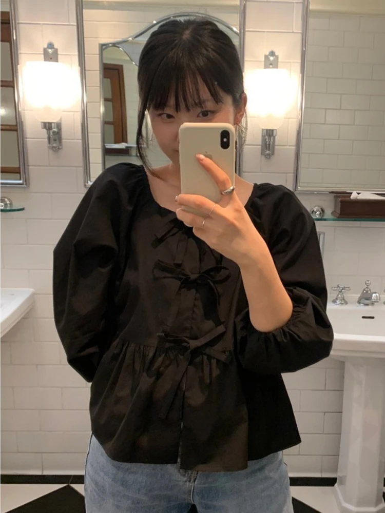 トレンドの半袖ロングシャツ レディース 春の新作 デザインセンス ボウタイ ルーズ バブルスリーブ ラウンドネック 無地シャツ