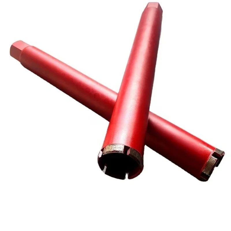 Diamond core bit for drilling solidified concrete and reinforced concrete with roof sections