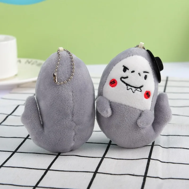 10 Cm tiburón sosteniendo dinero mochila de felpa colgante novedoso llavero de coche colgante de equipaje de dibujos animados de felpa muñeca divertida regalo de mano