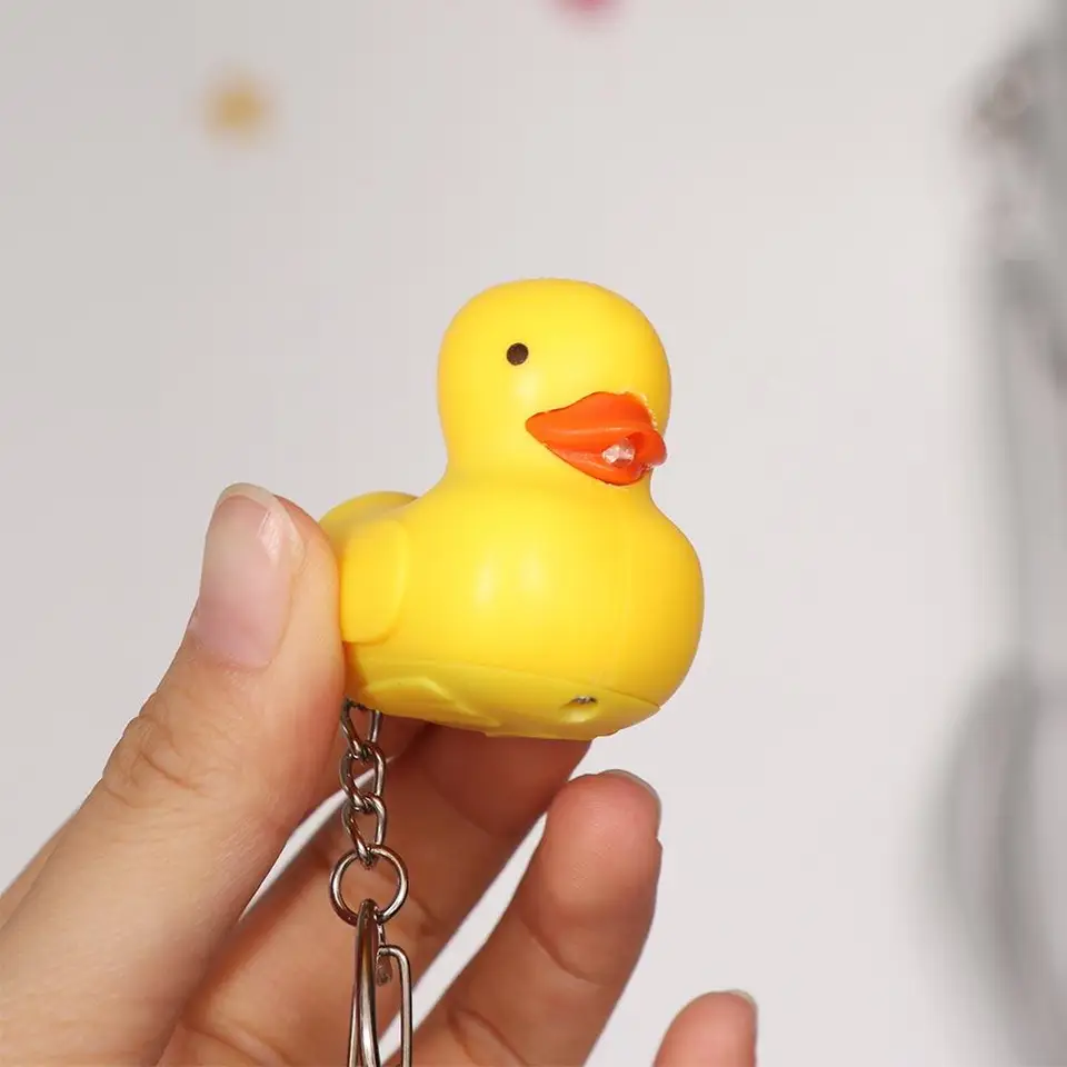 Llavero De Pato Recargable Con Sonido Y Luz – Dispositivo Anti-estrés Portátil De 5 X 5,5 Cm – Amarillo Y Verde