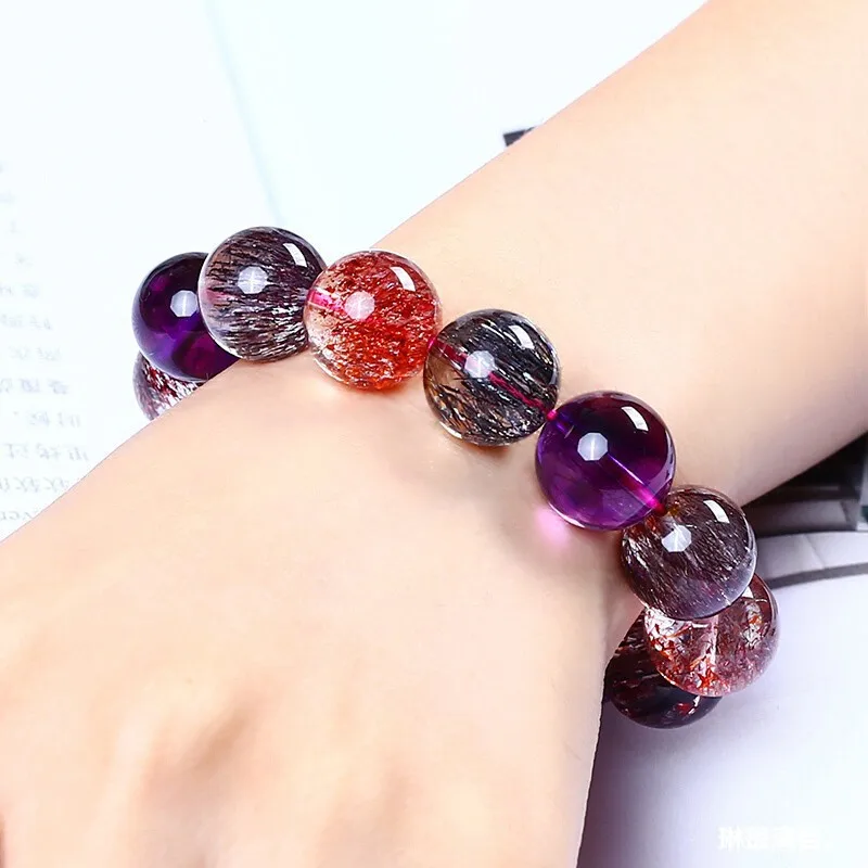 

Natural Super Seven Three-Wheel , Titanium , Golden Strawberry Quartz, Colorful Amethyst, Mica Crystal, Smooth Ame