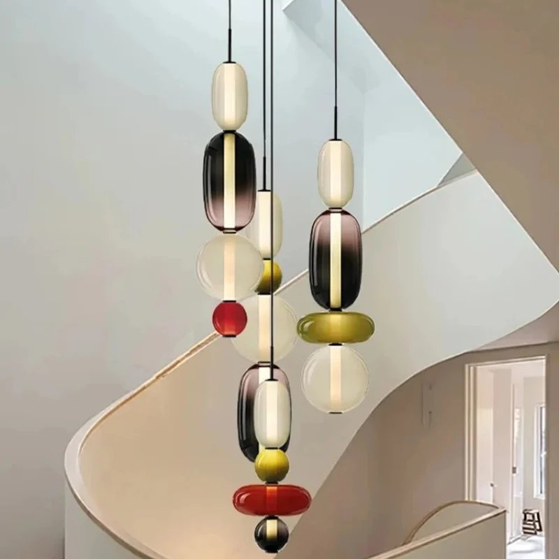 Lampade a sospensione moderne e creative a LED in vetro di caramelle Lampade a sospensione colorate Camera da letto italiana Soggiorno Cucina Ristorante Lampadario