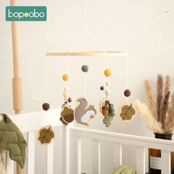 سرير للأطفال حديثي الولادة مصنوع من الخشب والسنجاب والصوف على شكل جرس خشخيشات متنقل للأطفال الصغار من سن 0 إلى 12 شهرًا خشخيشات متحركة تصلح كهدية لألعاب كوس الموسيقية