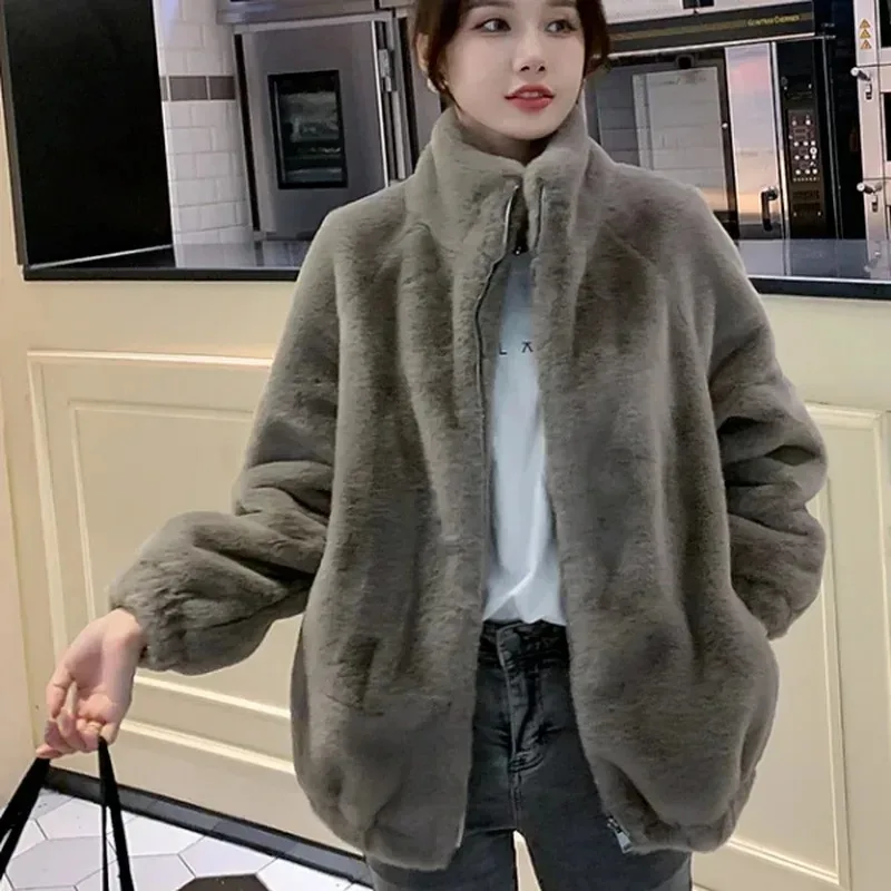 Corea autunno e inverno moda giacca temperamento donna elegante risvolto scanalato tasche larghe caldo visone imitazione pelliccia