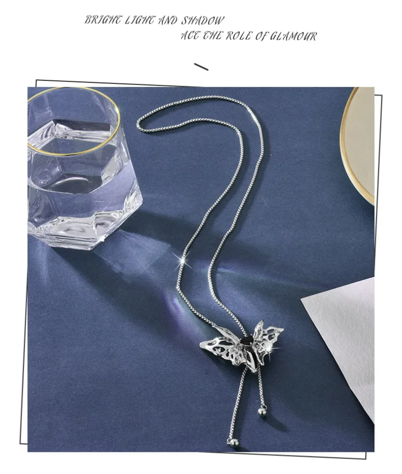 

High-end butterfly sweater chain for autumn and winter, a versatile and elegant long necklace paired with a tassel necklace