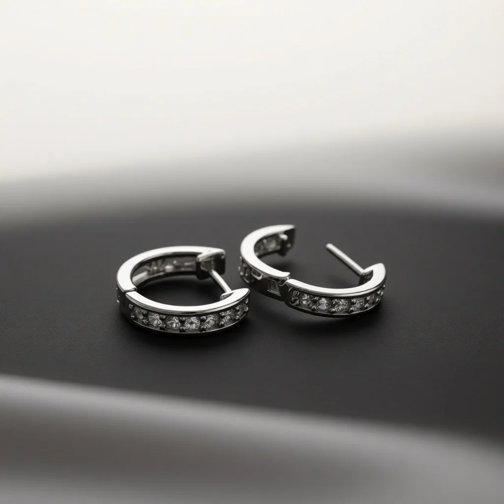 Silver‑Tone Huggie Hoop Earrings for Women, Pave Clear Zircon Hollow Cut‑Out Click‑Top Ear Hoops, Sleek Fashion Jewelry